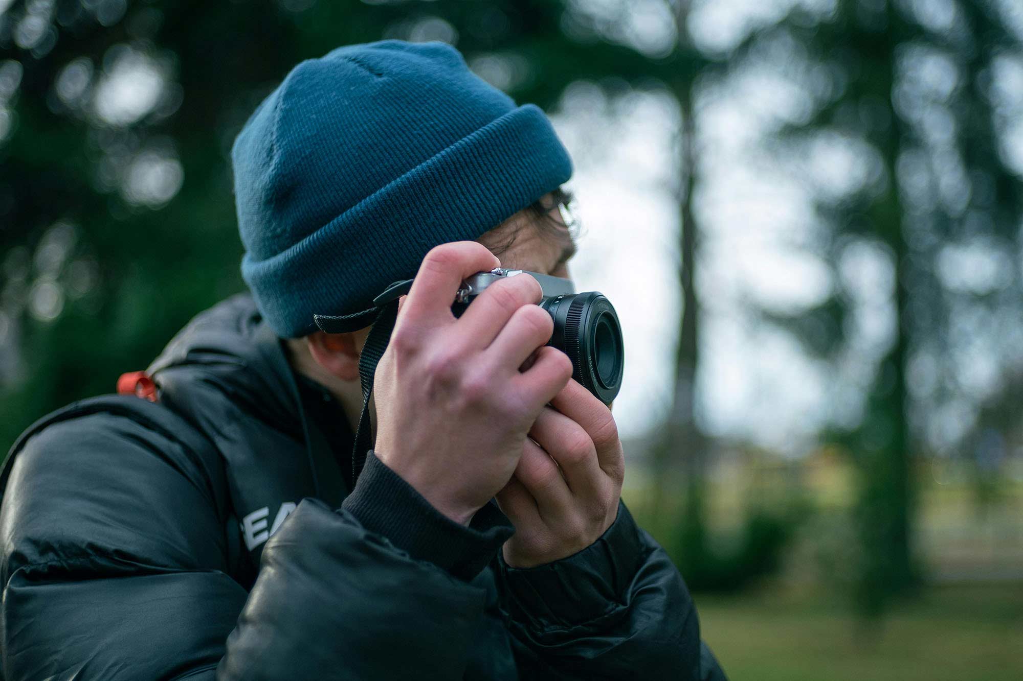 man behind camera